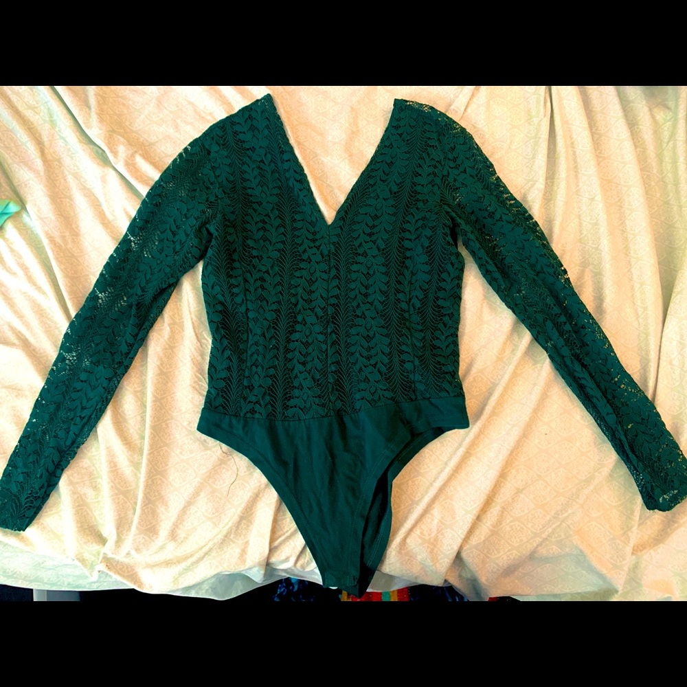 Green lace bodysuit with built in cloth in front.